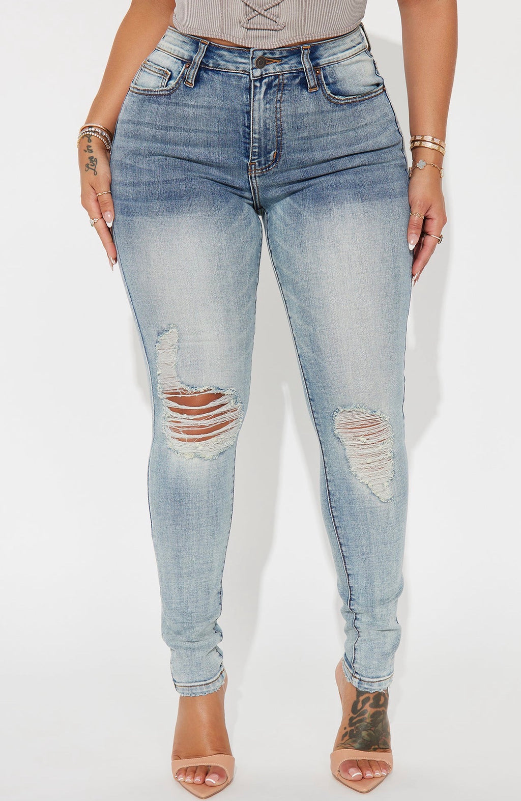 High-Rise Distressed Skinny Jeans in Light Wash