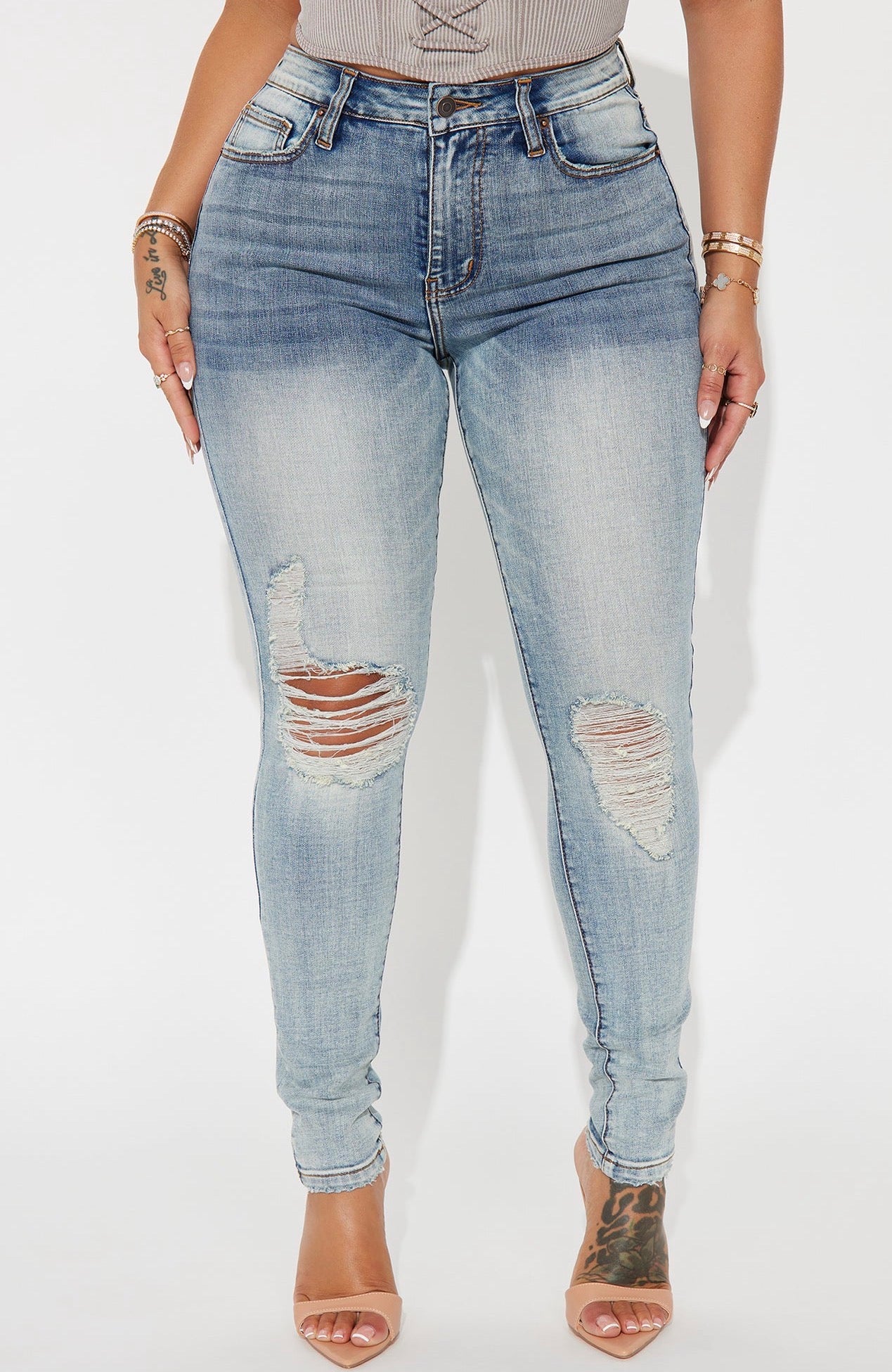 High-Rise Distressed Skinny Jeans in Light Wash