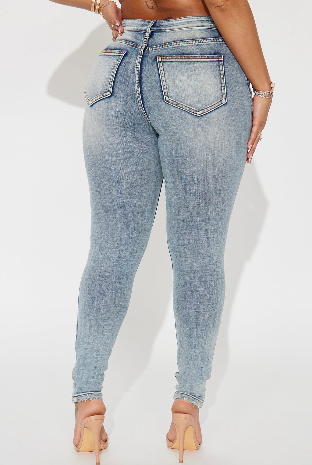 High-Rise Distressed Skinny Jeans in Light Wash
